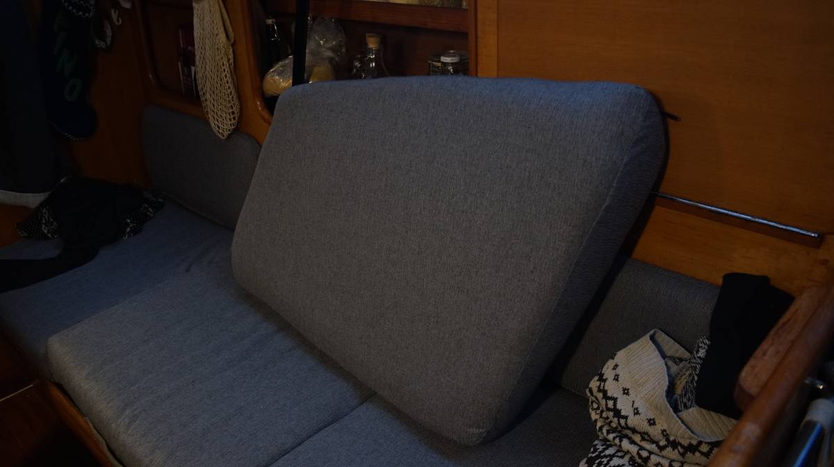 a newly-upholstered trapezoid cushion