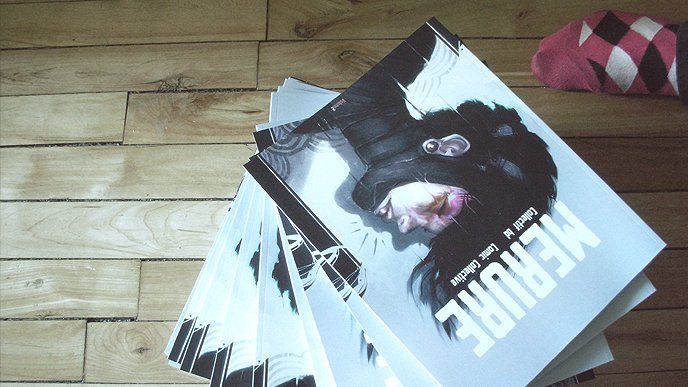 A photo of a pile of Merure 3 books on the ground