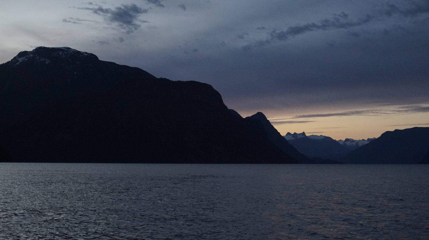 twilight at frances bay, with tall obscured mountains in view