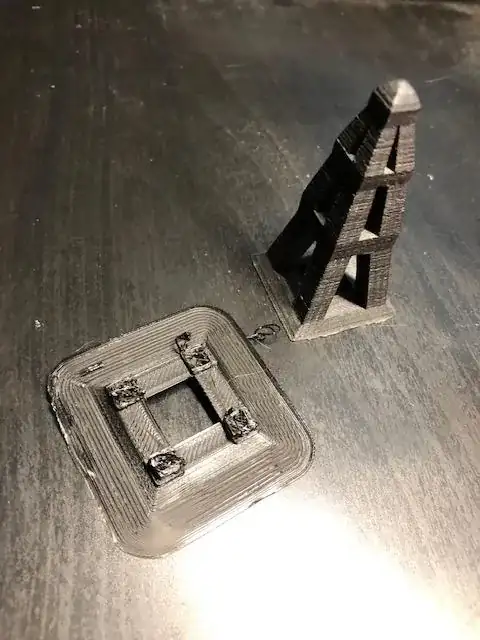 Photo of a stopped print with printing errors and the same model printed properly Photo of a stopped print with printing errors and the same model printed properly