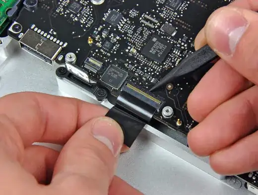 keyboard ribbon cable to the logic board