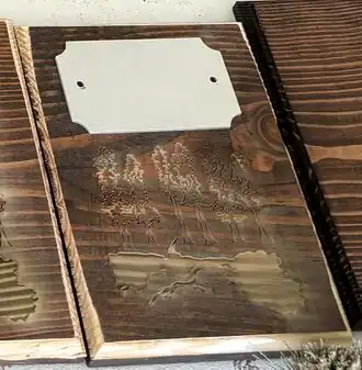 Figure 3.5 - Plaque after being stained, routed and engraved