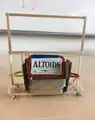 Fig 4b: Altoid podium with stir stick white board cart