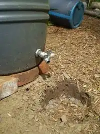 Fig. 12: The double spigot on the main holding tank