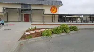 tessellating concrete pathConcrete path beautification of the main entrance using a tessellating falcon stamp.
