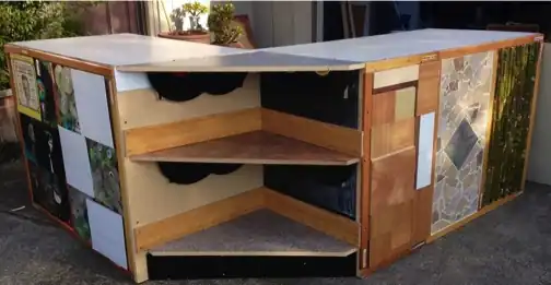 Upcycled checkout deskUpcycled albums and wood into a checkout desk.