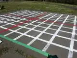 Outdoor math classroomA grid used to teach difficult math concepts to middle-school students.