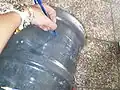 Drawing the line on the 5 gallon jug.