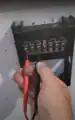 Multimeter testing reclaimed panel