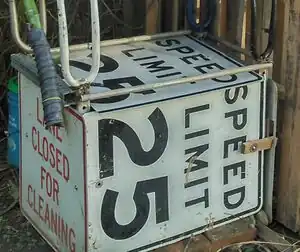 Fig 7: A second stage, made out of street signs attached to the main structure, sits directly below the 55 gallon barrel.