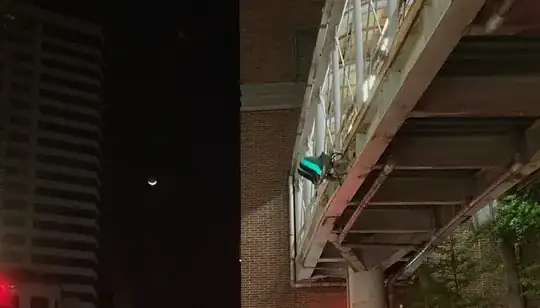 snapshot of the crescent Moon almost a horizontal smiley face from about 25° N