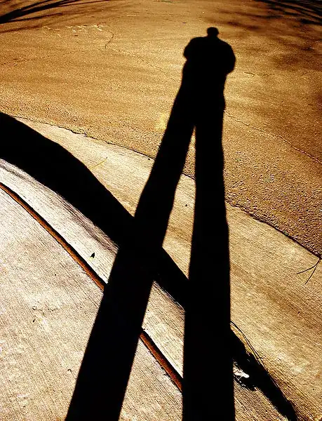 very long person shadow