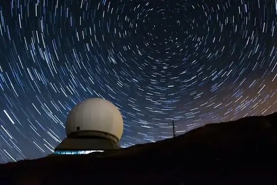 Photo of star trails around the north celestial pole, taken at the Grand Ballon mountain in Alsace, France