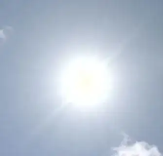 photo of the sun where it looks "glowing", with visible rays