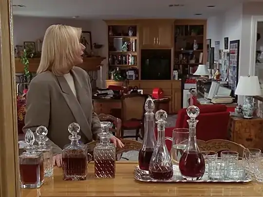 lady in front of several decanters