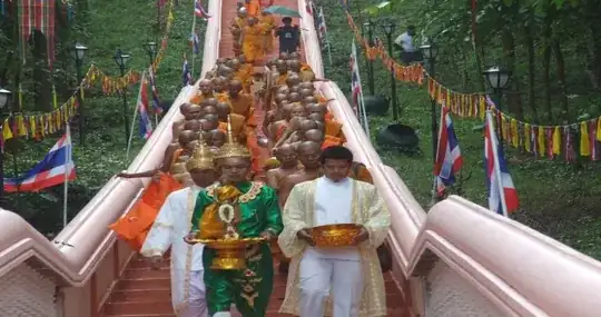 Alms round descending from staircase