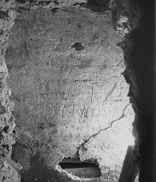 The Graffiti Wall, on the north side of the Tropaion, showing the repository. (Fabbrica di San Pietro)