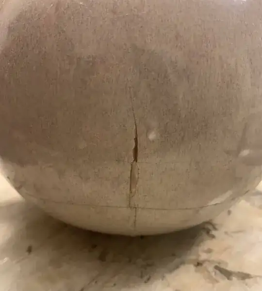 Image of crack in side of teapot