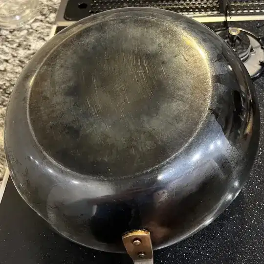 And for reference, this is what the pan's bottom looks like. I don't know if it is clear but it has a blueish tint.