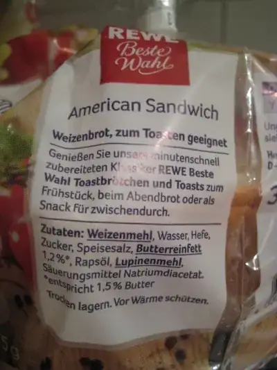 Packaging for REWE Beste Wahl American Sandwich loaf, listing "Lupinenmehl" as one of the ingredients