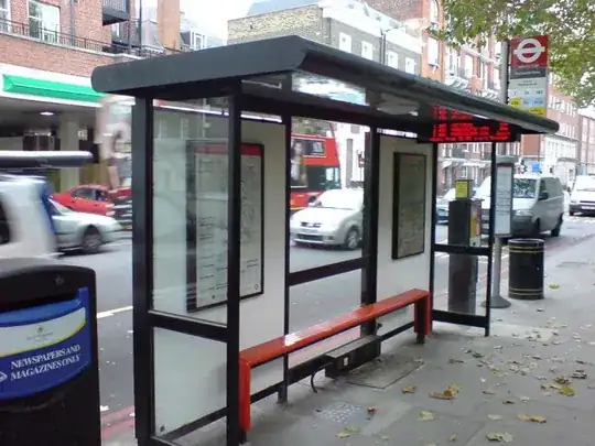 A London bus stop with a roof.