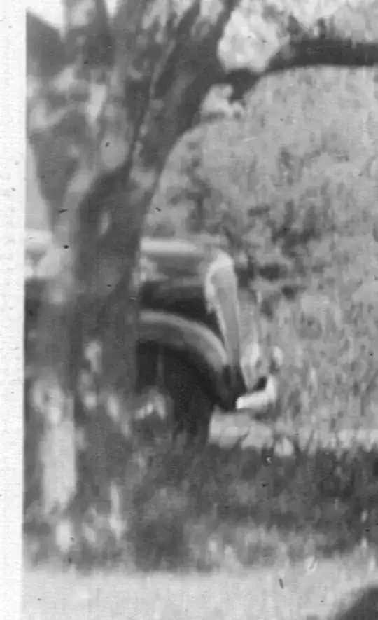 Snippet of front of possibly same car in photo dated September 23, 1942 from Kansas City, Missouri
