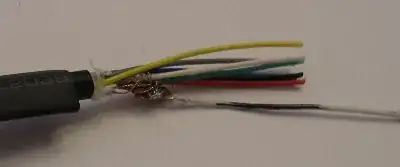 Image of brown/white wire from network cable tack-soldered to base of braid