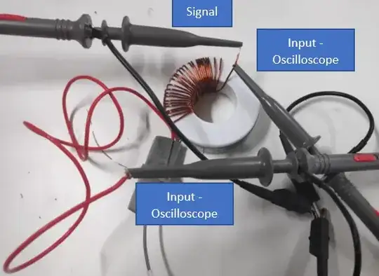 ferrite core with wires attached to winding