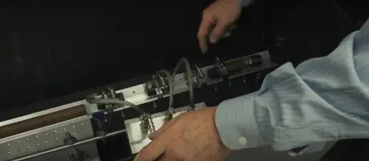 Bennett pointing to BB84 machine