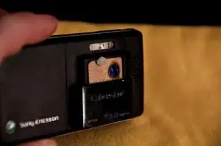 use some duct tape to mount your lens directly, use or blue Tack to hold the card mount