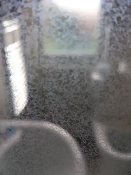 Discoloured shower door