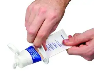 image of tube squeezer in action
