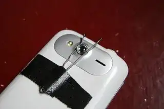 put that macro lens between hair clamp and used Macgyver's tape to secure it from moving