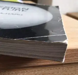 book cover now lies flat at corner