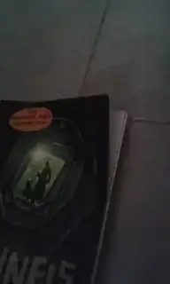 Paperback cover with bent corner