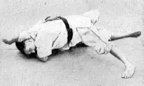 Mataemon Tanabe holding his opponent with *kata-gatame*