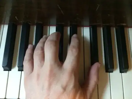 Left hand positioned to low note in right hand chord
