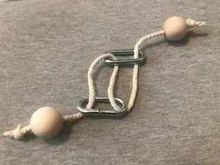 Simplified version of the puzzle with rings instead of wooden blocks