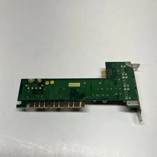 Backside of the card, showing pin 4 connected and tracing towards the bottom USB port