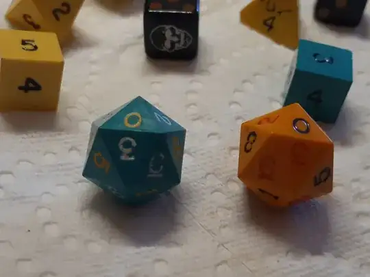 close-up featuring the two d20s, with the 0s on the top