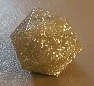 shiny gold icosahedron numbered 0–9 twice