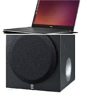 laptop sitting on a speaker