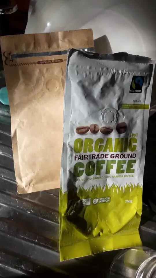 Two types of coffee bags. None of them displays any information about materials.