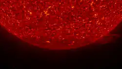 The Sun's South Pole. Material can be seen erupting from the Sun in the lower right side of the image.  March 2007