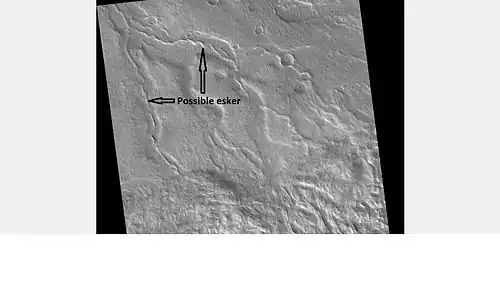 Esker, as seen by HiRISE under the HiWish program  Eskers form when a stream runs under a glacier.