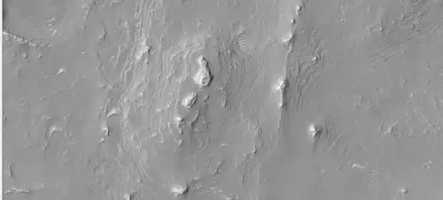 Layers in a butte in Arabia, as seen by HiRISE under HiWish program.
