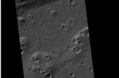 Wide view of a field of ring mold craters, as seen by HiRISE under HiWish program