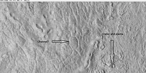 Close-up of surface near ejecta of crater, as seen by HiRISE under HiWish program.  Melted ice from ground water may have formed small channel.