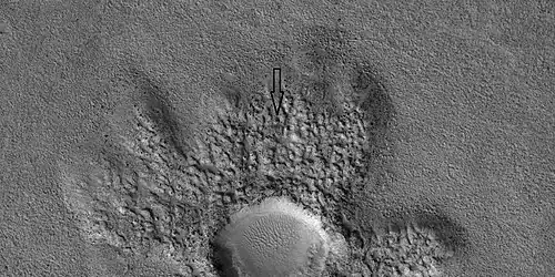 Close view of ejecta of pedestal crater with boulders in pits, as seen by HiRISE under HiWish program.  Arrow shows one of example of a boulder sitting in a pit.  This image will be enlarged to better show this in the next two images.