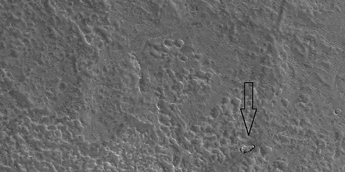 Out of place rock,  as seen by HiRISE under HiWish program The arrow points to a large rock that is definitely out of place.  It may be a meteorite or it may have been tossed here by a nearby impact.